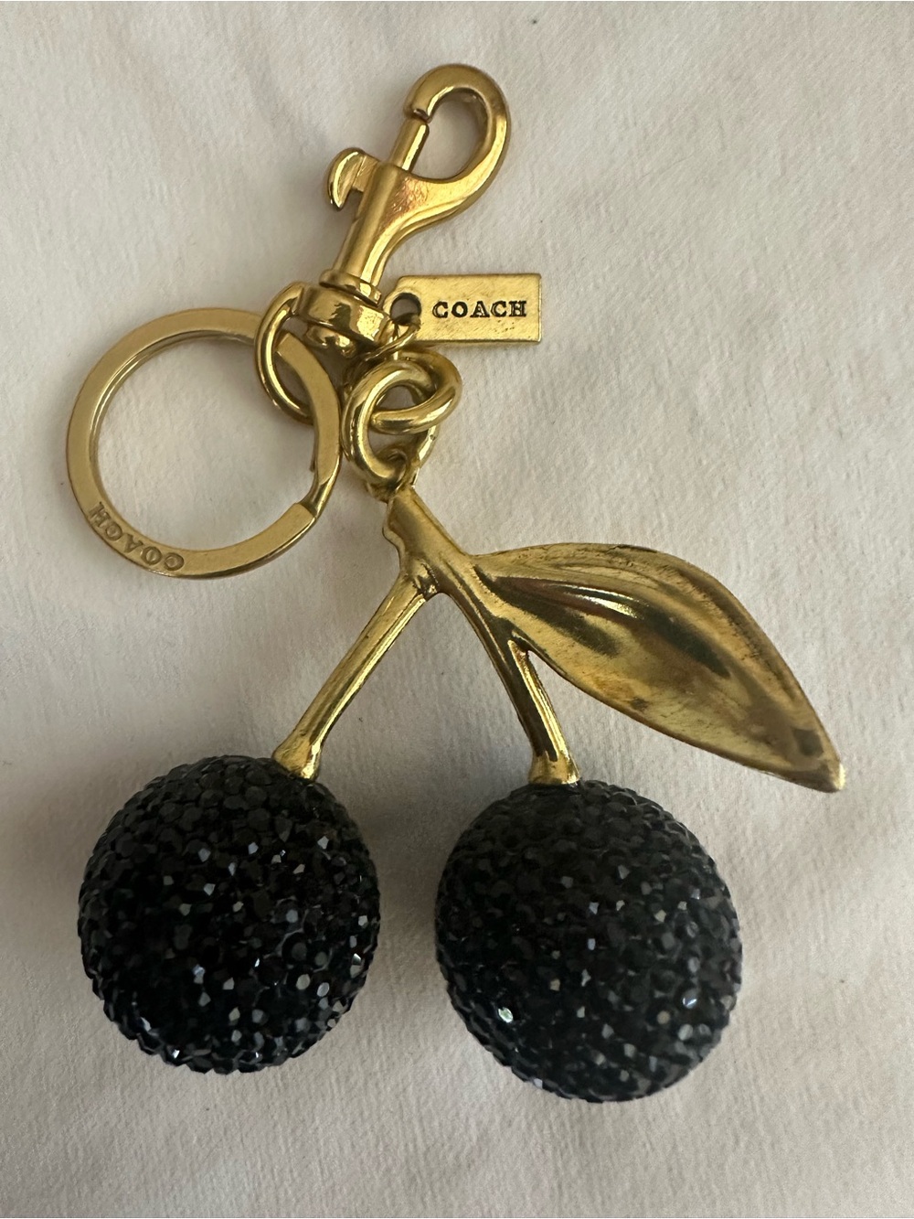 Coach Gold-Tone Black Crystal Cherry Key Charm